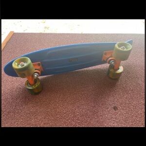 Blue and Orange Penny board skateboard 22in the original beach board cruiser